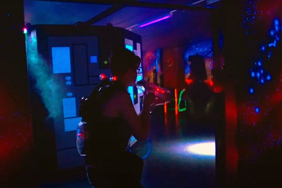 Adult playing laser tag