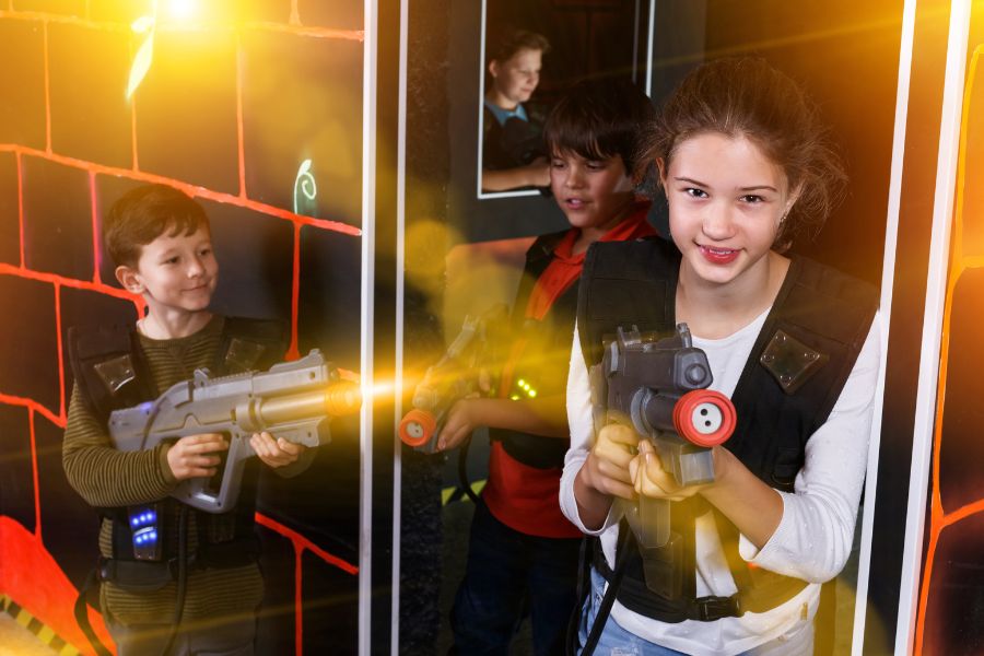 Kids safely playing laser tag