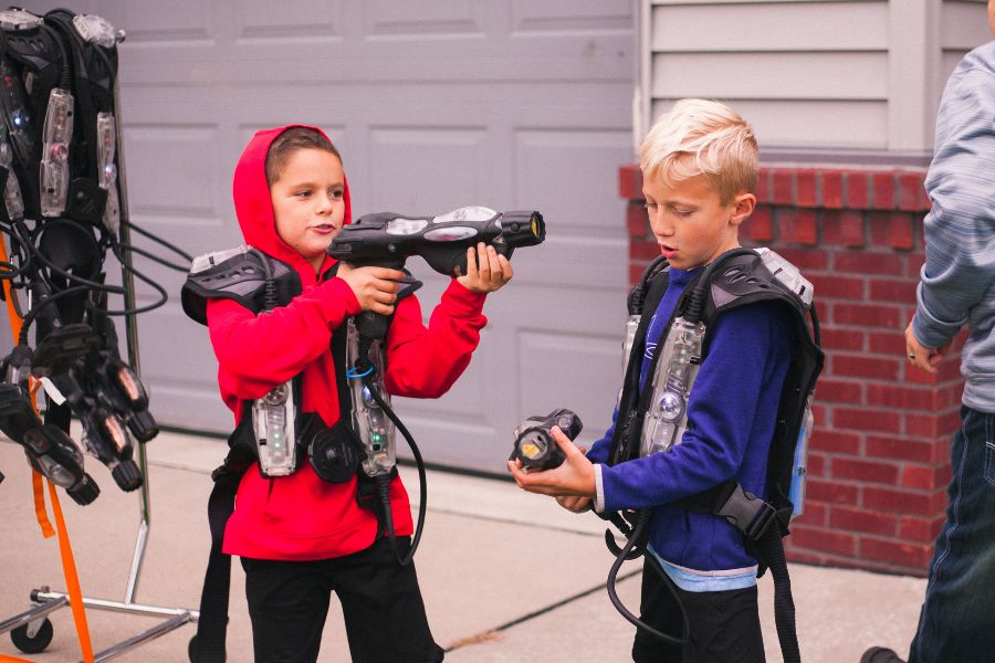 Kids wearing and preparing for laser tag