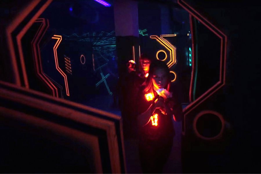 Playing at a laser tag facility in pairs