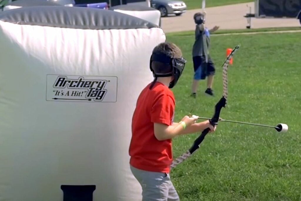 Playing archery tag as paintball alternative