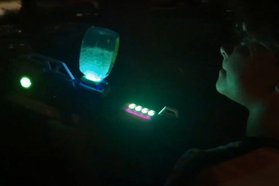 Playing in a glow-in-the-dark gel blaster party